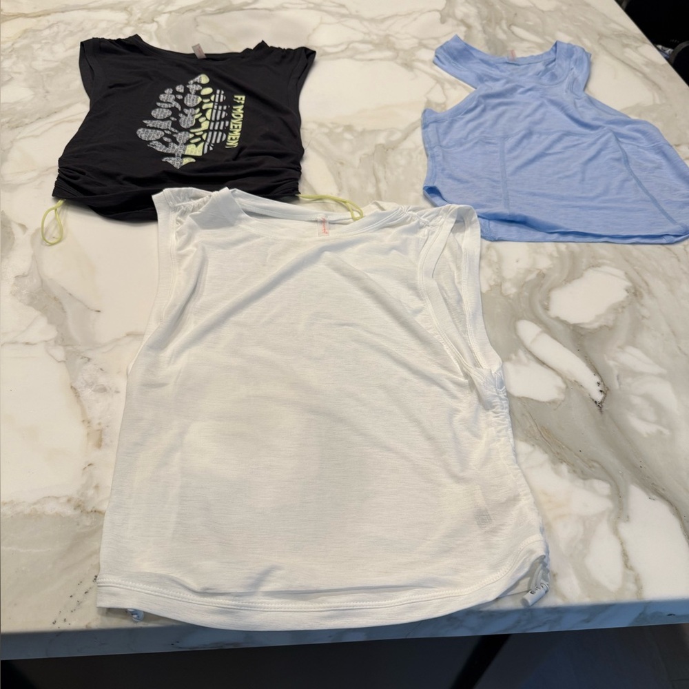3 Pack Free People White blue and black Sleeveless Tank Tops